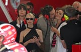 Rebecca Ferguson and Anya Taylor Joy with husbands at Silverstone 2