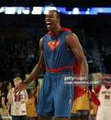 dwight-howard-of-the-orlando-magic-wearing-a-superman-cape-in-the-sprite-slam-dunk-contest