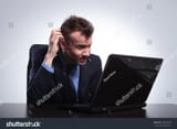 stock-photo-young-business-man-reading-something-on-his-laptop-and-not-understanding-scratching-his-head-on-a-189588278