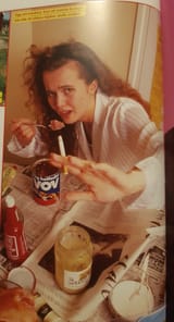 Izabella Scorupco eating dog food