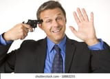 businessman-holding-gun-his-head-260nw-18883255