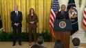 Joe Biden snacks while Obama speaks_thumb.jpg