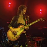 Jimmy-Page-with-his-Number-One-Gibson-Les-Paul-guitar-The-Song-Remains-the-Same-1976