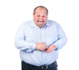 unhappy-fat-man-blue-shirt-27086610