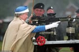 queen-elizabeth-with-a-machine-gun