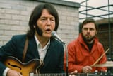 20250402_1939_60s Rooftop Band Scene_simple_compose_01jqwdzfcyeb49qbcg2m9xg4dn