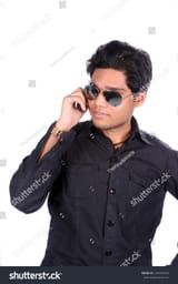 stock-photo-a-young-indian-guy-wearing-sunglasses-stylishly-talking-on-the-phone-on-white-studio-background-104933294