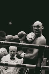 Pedo getting chinned but in black and white