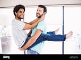 happy-gay-couple-dancing-F8MXXT