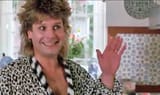 Ozzy-Osbourne-in-a-leoprad-print-dressing-gown-in-1988-599112