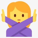 woman crossing arms as if to reject