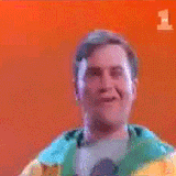 man wearing a banana suit trapped inside an orange