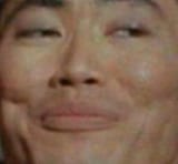 smug chinese man smirking at you smirkily