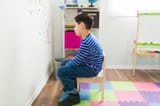 caucasian-elementary-boy-sitting