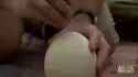 african cooking an omelet in sand_thumb.jpg
