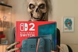 20250622_0318_Skeleton Holding Console Box_remix_01jyapse8teksr9v5p5t76g7fv