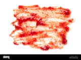randomly-shaped-thin-messy-smear-of-homemade-red-strawberry-or-raspberry-jam-on-white-showing-the-texture-of-the-fruit-pulp-2GJ02GJ
