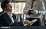 stock-photo-businessman-ordering-food-from-menu-in-restaurant-business-man-choosing-dishes-from-restaurant-1806744901