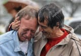 two-men-seen-crying-during-route-funeral-1500w-8071266f