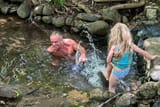 rfk jr swims in poop creek with grandchildren