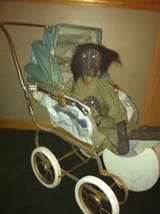 doll on bed revealed