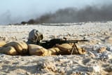Syrian_soldier_with_a_machine_gun