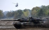 the-leopard-2a6-tank-and-the-tiger-helicopter-of-the-news-photo-1666205681-3706139117