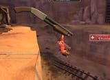 Engie firmly grabs the giant shotgun