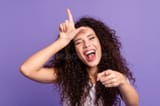 close-up-photo-beautiful-her-lady-index-finger-point-you-hand-show-loser-symbol-forehead-laughing-out-loud-close-up-photo-144265820