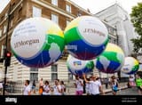 england-london-the-annual-pride-festival-group-of-jp-morgan-employees-holding-balloons-2A3G89C