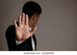 businessman-his-hand-raised-signal-260nw-2156354109