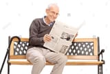 man reading newspaper