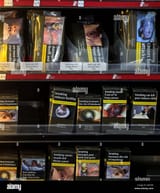 cigarettes-and-tobacco-for-sale-in-a-corner-shop-in-liverpool-in-standardised-J66TR9