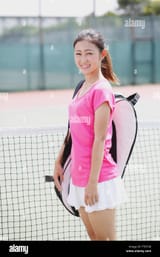 young-japanese-tennis-player-on-the-court-FTDTXR
