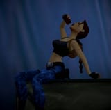 Tomb Raider 3 Remastered Lara drinking a soft drink while sitting in the back of a box truck