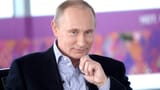 Smug Putin