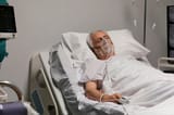 senior-man-breathing-with-special-equipment-hospital_23-2149011302