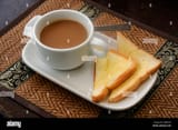 hot-coffee-with-toast-butter-with-breakfast-in-morning-time-at-resort-HWKT57