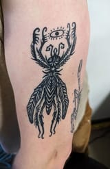 mantis-god-tattoo-v0-k0hdz6qkedwb1