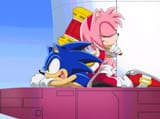 Amy sits on Sonic