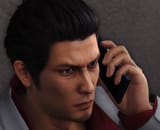 Kiryu holding phone