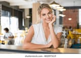 portrait-happy-smiling-woman-waiting-260nw-482097619