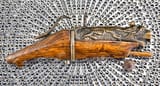 101182655-antique-chinese-19th-century-matchlock-pistol-sometimes-called-a-hand-cannon