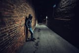 suspicious-man-dark-alley-waiting-600nw-791468305