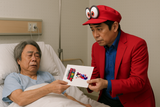 Shigeru Miyamoto and Yoshiaki Koizumi