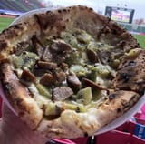 kiwi-sausage-pizza-from-japanese-soccer-stadium-v0-6fjaeb6a7zma1