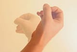 250px-Fingers_and_thumb_in_circle_downward_motion[1]