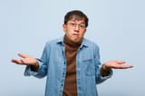 young-chinese-man-confused-doubtful_1187-17486