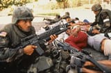 US Soldiers taking cover with civilians Invasion of Panama