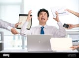 frustrated-office-work-at-his-desk-BRH66K